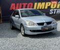 Сірий Міцубісі Lancer, об'ємом двигуна 1.58 л та пробігом 234 тис. км за 2800 $, фото 1 на Automoto.ua