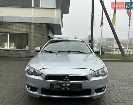 Серый Мицубиси Лансер, объемом двигателя 2 л и пробегом 279 тыс. км за 4999 $, фото 1 на Automoto.ua