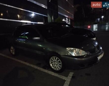 Сірий Міцубісі Lancer, об'ємом двигуна 1.58 л та пробігом 209 тис. км за 2900 $, фото 1 на Automoto.ua