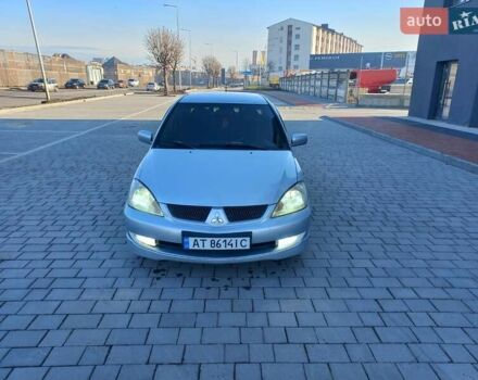 Серый Мицубиси Лансер, объемом двигателя 1.6 л и пробегом 228 тыс. км за 3450 $, фото 1 на Automoto.ua