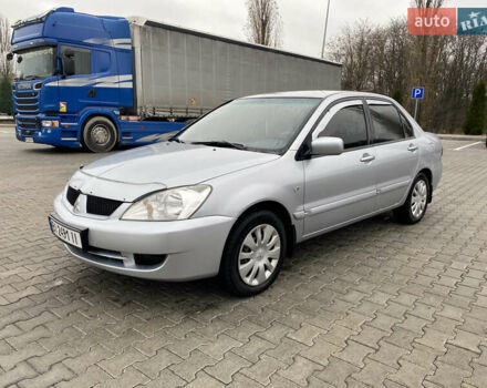 Сірий Міцубісі Lancer, об'ємом двигуна 1.58 л та пробігом 280 тис. км за 4650 $, фото 1 на Automoto.ua