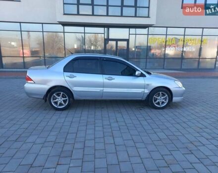 Серый Мицубиси Лансер, объемом двигателя 1.6 л и пробегом 228 тыс. км за 2999 $, фото 9 на Automoto.ua