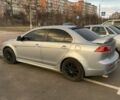 Серый Мицубиси Лансер, объемом двигателя 2 л и пробегом 289 тыс. км за 6500 $, фото 1 на Automoto.ua
