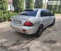 Сірий Міцубісі Lancer, об'ємом двигуна 1.6 л та пробігом 180 тис. км за 5350 $, фото 4 на Automoto.ua