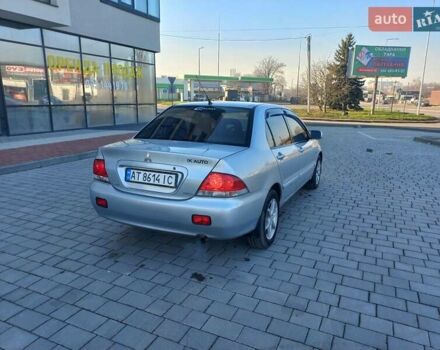 Серый Мицубиси Лансер, объемом двигателя 1.6 л и пробегом 228 тыс. км за 3450 $, фото 6 на Automoto.ua