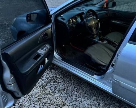 Серый Мицубиси Лансер, объемом двигателя 1.58 л и пробегом 227 тыс. км за 3200 $, фото 11 на Automoto.ua