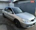 Сірий Міцубісі Lancer, об'ємом двигуна 1.6 л та пробігом 60 тис. км за 7000 $, фото 1 на Automoto.ua