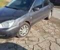 Серый Мицубиси Лансер, объемом двигателя 1.6 л и пробегом 153 тыс. км за 5600 $, фото 6 на Automoto.ua