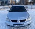 Сірий Міцубісі Lancer, об'ємом двигуна 1.6 л та пробігом 243 тис. км за 4999 $, фото 1 на Automoto.ua