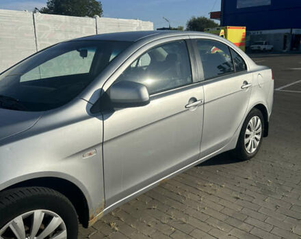 Серый Мицубиси Лансер, объемом двигателя 1.5 л и пробегом 230 тыс. км за 6300 $, фото 3 на Automoto.ua