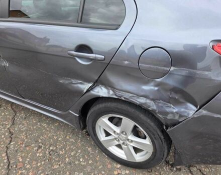 Сірий Міцубісі Lancer, об'ємом двигуна 1.8 л та пробігом 44 тис. км за 3300 $, фото 13 на Automoto.ua