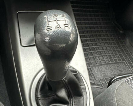 Мицубиси Лансер 2009 в Киеве на Automoto.ua Серый Мицубиси Лансер, объемом двигателя 1.58 л и пробегом 94 тыс. км за 5990 $, фото 24 на Automoto.ua