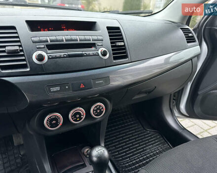 Серый Мицубиси Лансер, объемом двигателя 2 л и пробегом 279 тыс. км за 4999 $, фото 18 на Automoto.ua