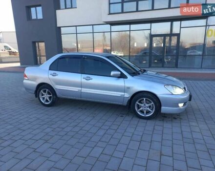 Серый Мицубиси Лансер, объемом двигателя 1.6 л и пробегом 228 тыс. км за 2999 $, фото 10 на Automoto.ua