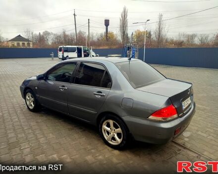 Сірий Міцубісі Lancer, об'ємом двигуна 1.6 л та пробігом 197 тис. км за 3600 $, фото 2 на Automoto.ua
