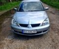 Сірий Міцубісі Lancer, об'ємом двигуна 1.6 л та пробігом 233 тис. км за 5000 $, фото 1 на Automoto.ua