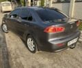Сірий Міцубісі Lancer, об'ємом двигуна 1.5 л та пробігом 236 тис. км за 6000 $, фото 5 на Automoto.ua