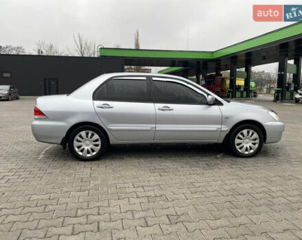 Сірий Міцубісі Lancer, об'ємом двигуна 1.58 л та пробігом 280 тис. км за 4650 $, фото 7 на Automoto.ua