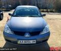 Сірий Міцубісі Lancer, об'ємом двигуна 1.6 л та пробігом 282 тис. км за 3600 $, фото 1 на Automoto.ua