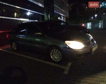 Сірий Міцубісі Lancer, об'ємом двигуна 1.58 л та пробігом 209 тис. км за 2900 $, фото 2 на Automoto.ua