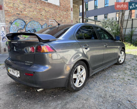 Серый Мицубиси Лансер, объемом двигателя 2 л и пробегом 222 тыс. км за 6999 $, фото 4 на Automoto.ua