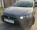 Сірий Міцубісі Lancer, об'ємом двигуна 1.5 л та пробігом 236 тис. км за 6000 $, фото 2 на Automoto.ua