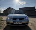 Сірий Міцубісі Lancer, об'ємом двигуна 1.6 л та пробігом 294 тис. км за 4300 $, фото 1 на Automoto.ua
