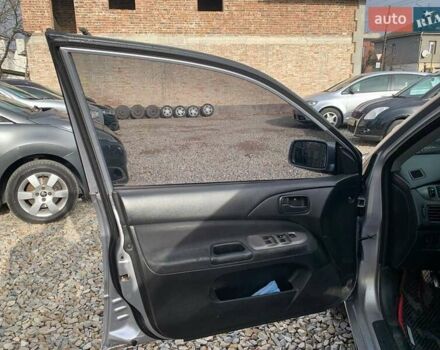 Серый Мицубиси Лансер, объемом двигателя 1.58 л и пробегом 227 тыс. км за 3599 $, фото 8 на Automoto.ua