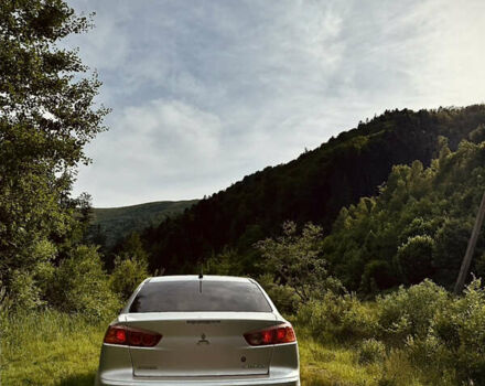 Серый Мицубиси Лансер, объемом двигателя 2 л и пробегом 143 тыс. км за 6850 $, фото 1 на Automoto.ua