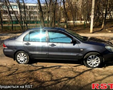 Сірий Міцубісі Lancer, об'ємом двигуна 1.6 л та пробігом 230 тис. км за 4200 $, фото 3 на Automoto.ua