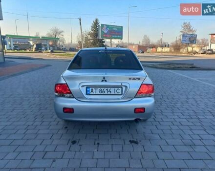 Серый Мицубиси Лансер, объемом двигателя 1.6 л и пробегом 228 тыс. км за 3450 $, фото 7 на Automoto.ua