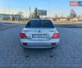 Серый Мицубиси Лансер, объемом двигателя 1.6 л и пробегом 228 тыс. км за 3450 $, фото 7 на Automoto.ua