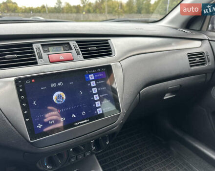 Сірий Міцубісі Lancer, об'ємом двигуна 1.58 л та пробігом 94 тис. км за 6500 $, фото 27 на Automoto.ua