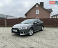 Сірий Міцубісі Lancer, об'ємом двигуна 2 л та пробігом 226 тис. км за 7600 $, фото 1 на Automoto.ua