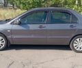 Сірий Міцубісі Lancer, об'ємом двигуна 1.6 л та пробігом 165 тис. км за 6000 $, фото 1 на Automoto.ua