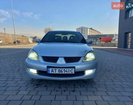 Серый Мицубиси Лансер, объемом двигателя 1.6 л и пробегом 228 тыс. км за 2999 $, фото 6 на Automoto.ua