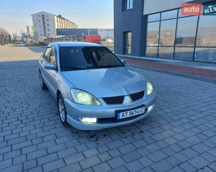 Серый Мицубиси Лансер, объемом двигателя 1.6 л и пробегом 228 тыс. км за 2999 $, фото 7 на Automoto.ua