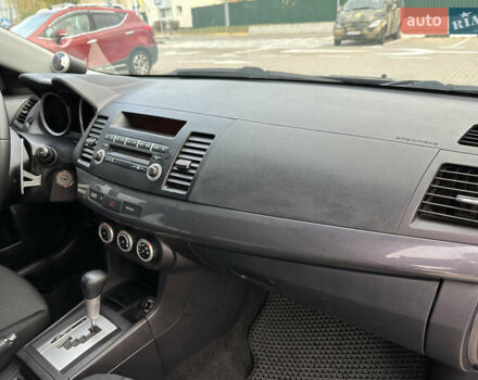 Сірий Міцубісі Lancer, об'ємом двигуна 2 л та пробігом 103 тис. км за 7500 $, фото 8 на Automoto.ua