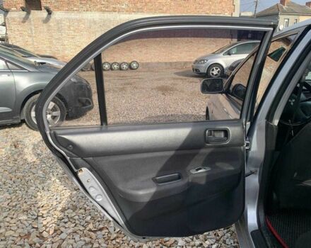 Серый Мицубиси Лансер, объемом двигателя 1.6 л и пробегом 227 тыс. км за 3599 $, фото 9 на Automoto.ua