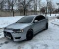 Серый Мицубиси Лансер, объемом двигателя 2 л и пробегом 190 тыс. км за 6900 $, фото 1 на Automoto.ua