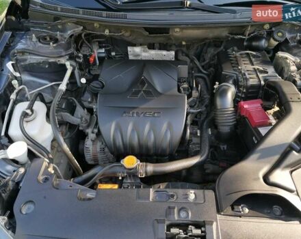 Серый Мицубиси Лансер, объемом двигателя 1.5 л и пробегом 183 тыс. км за 5900 $, фото 8 на Automoto.ua