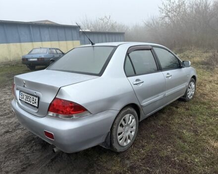 Сірий Міцубісі Lancer, об'ємом двигуна 1.6 л та пробігом 230 тис. км за 3400 $, фото 3 на Automoto.ua