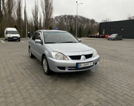 Сірий Міцубісі Lancer, об'ємом двигуна 1.6 л та пробігом 240 тис. км за 4650 $, фото 2 на Automoto.ua