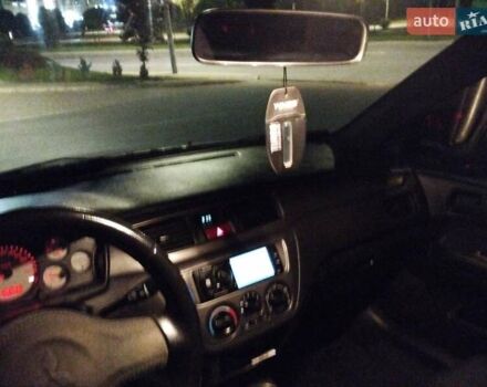 Сірий Міцубісі Lancer, об'ємом двигуна 1.58 л та пробігом 209 тис. км за 2900 $, фото 3 на Automoto.ua