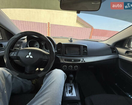 Серый Мицубиси Лансер, объемом двигателя 2 л и пробегом 439 тыс. км за 8000 $, фото 6 на Automoto.ua
