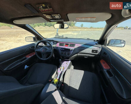 Сірий Міцубісі Lancer, об'ємом двигуна 1.6 л та пробігом 337 тис. км за 4500 $, фото 11 на Automoto.ua