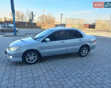 Серый Мицубиси Лансер, объемом двигателя 1.58 л и пробегом 228 тыс. км за 3600 $, фото 11 на Automoto.ua