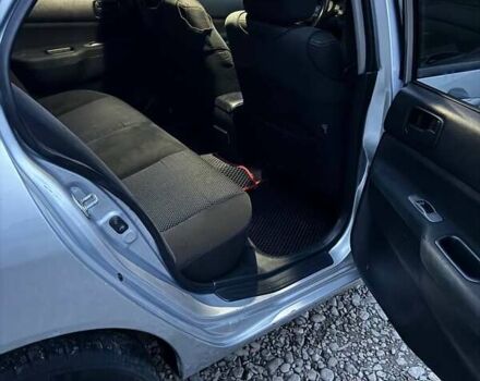 Серый Мицубиси Лансер, объемом двигателя 1.58 л и пробегом 227 тыс. км за 3200 $, фото 14 на Automoto.ua