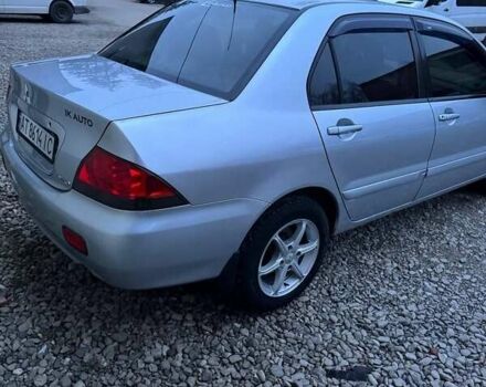 Серый Мицубиси Лансер, объемом двигателя 1.58 л и пробегом 227 тыс. км за 3200 $, фото 10 на Automoto.ua