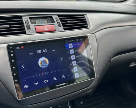 Сірий Міцубісі Lancer, об'ємом двигуна 1.58 л та пробігом 94 тис. км за 6500 $, фото 26 на Automoto.ua